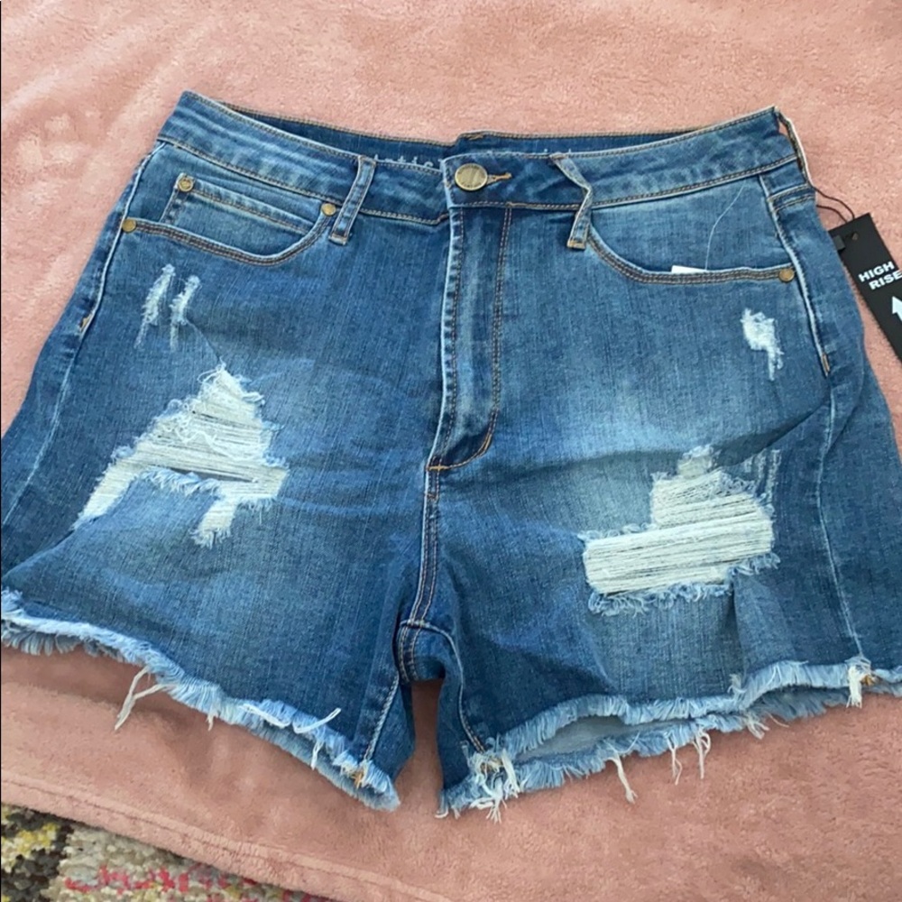 Distressed high rise denim shorts